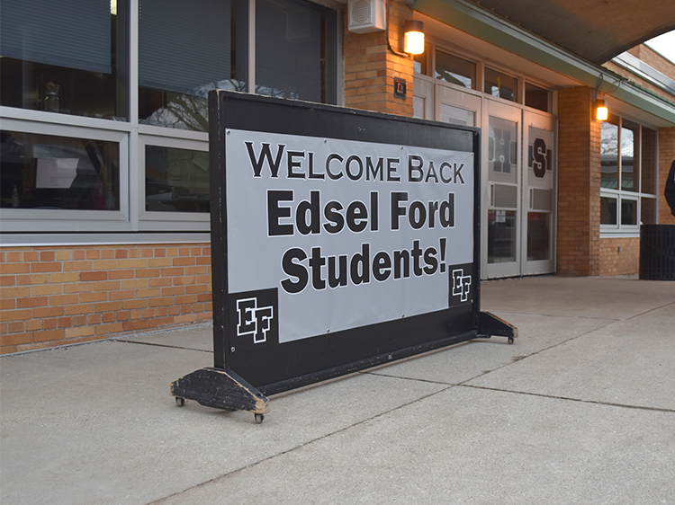 A sign near the high school doors says Welcome Back Edsel Ford Students