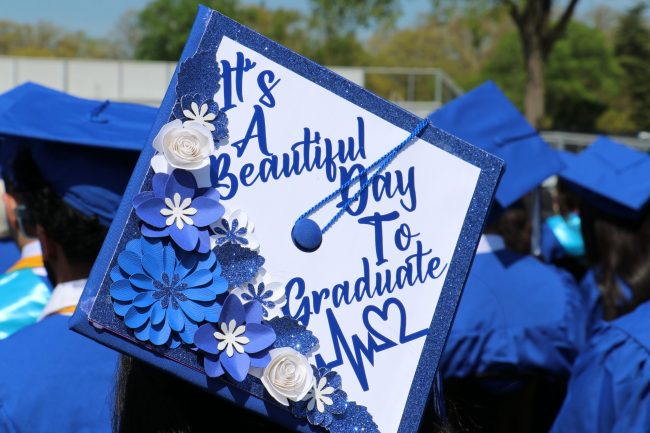 Graduation cap decorated to say "It's a beautiful day to graduate."