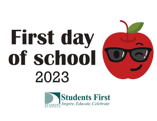 Sign with apple smiley face wearing sunglasses and saying First Day of School 2023