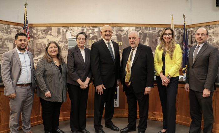 Members of the Dearborn Public Schools Board of Education pose on Jan. 10, 2024 after their annual reorganization meeting. Pictured from the left are Trustee Adel Mozip, Trustee Roxanne McDonald, Board Vice President Mary Petlichkoff, Board President Hussein Berry, Board Treasurer Pat D’Ambrosio, Board Secretary Irene Watts and Trustee Jim Thorpe.