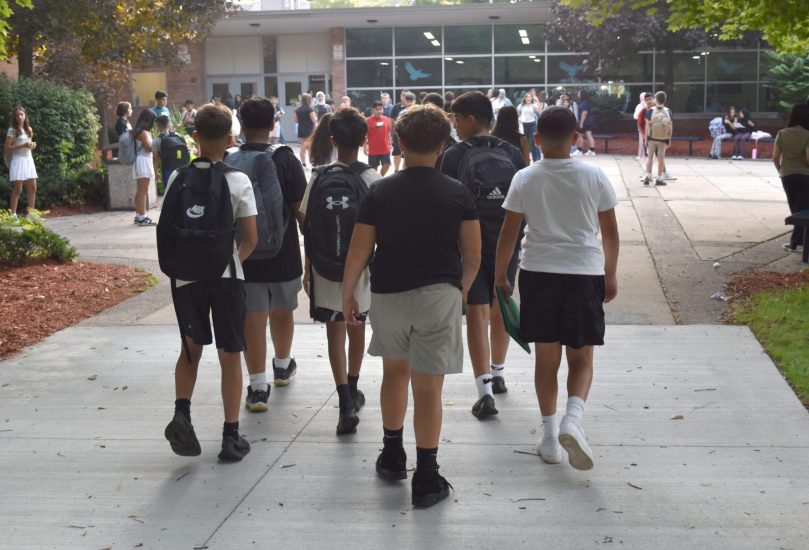 A group of students walks into Bryant middle school on the first day of school 2024