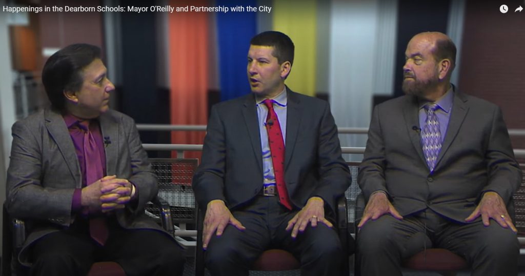 Communications Director David Mustonen, Superintendent Glenn Maleyko and Mayor John "Jack" O'Reilly appear in this still from a podcast on the district's partnership with the city.