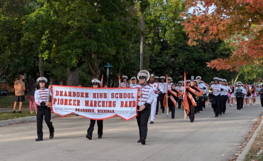 Dearborn High's Marching Band performs in the 2024 homecoming parade.